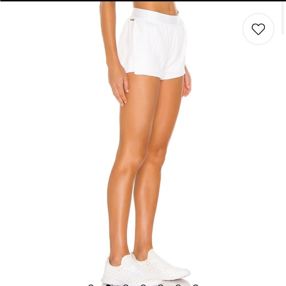 - Alala Court short white pearl sheen large L Revolve